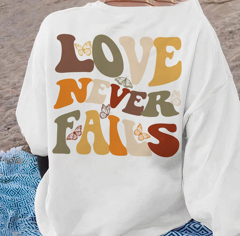 Groovy Love Never Fails Jesus Sweatshirt