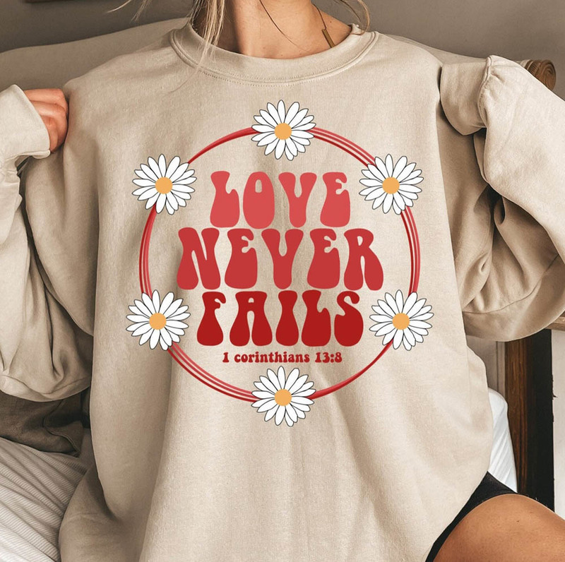Love Never Fails Religious Daisy Love Sweatshirt