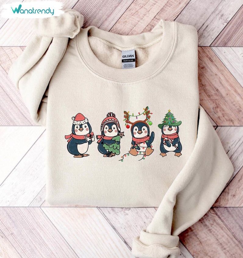 Penguin Merry Christmas Shirt, Cute Penguin Xmas Light Long Sleeve Unisex Hoodie