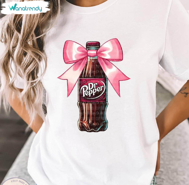 Sip In Style With This Cute Dr Pepper Shirt, Fun Pink Bow For Dr Pepper Lovers Short Sleeve Tee Tops